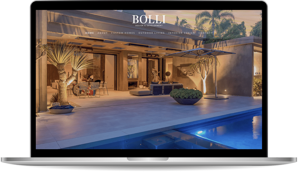 A laptop displays a modern architecture website with an image of a luxurious outdoor patio, pool, plants, and contemporary furniture. The website's menu includes options like Home, About, and Contact.